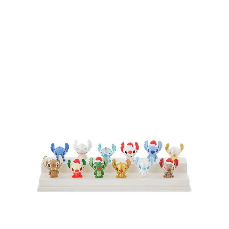 Figura mistery bag enesco grand jester disney mini stitch navideÑo 1 unidad aleatoria